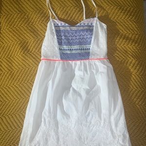 Mini white dress with crochet detail
